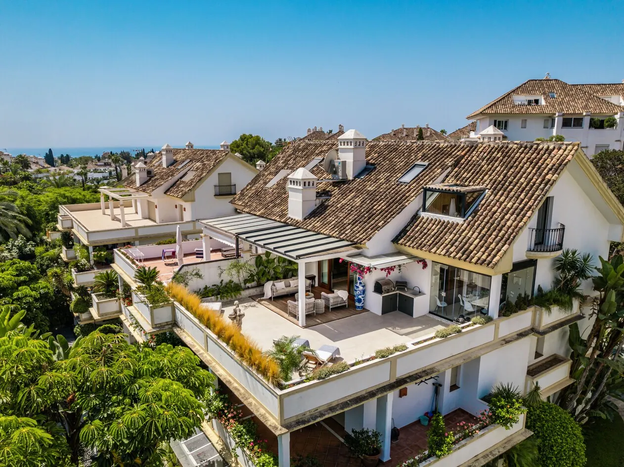 Terraced residential building with rooftop gardens