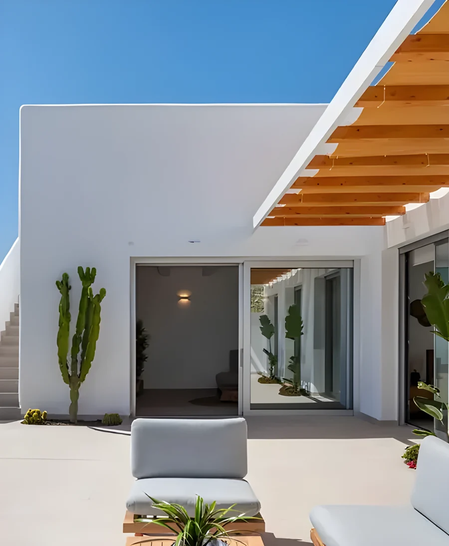Open doorway of a white villa in the Algarve