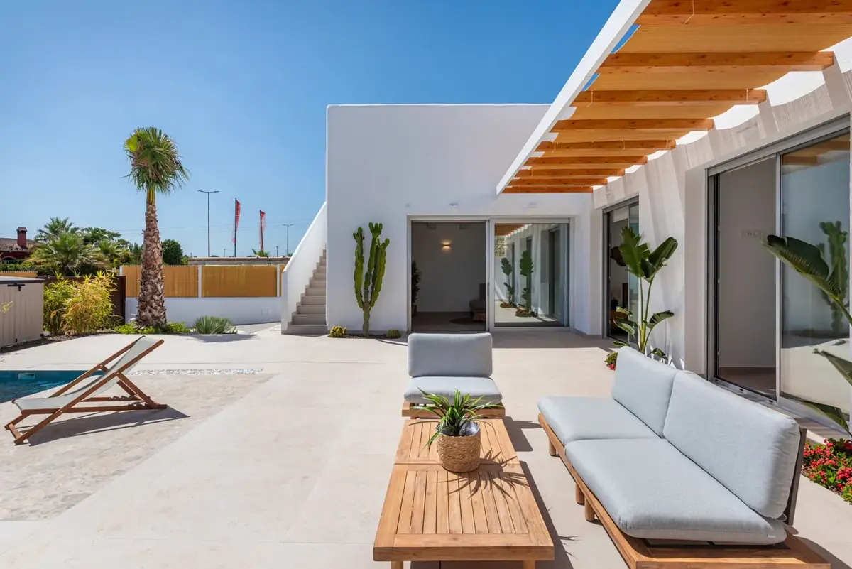 Whitewashed villa terrace with pool in the Algarve